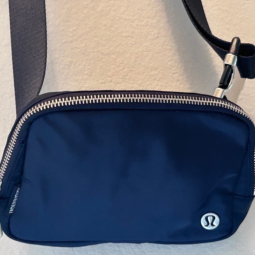 Bought 6 months ago! Used 2x! 
Lululemon Athletica Blue Belt/Crossbody Bag!